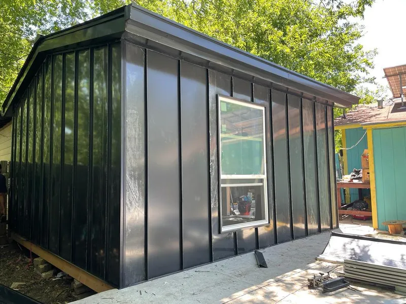 Black standing seam metal wall panels for Roof Inspection in Henderson